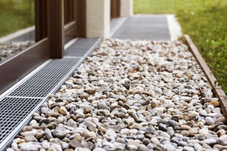 French Drain Installation vs. Grading: Which Fixes Your Soggy Destin Yard Faster?